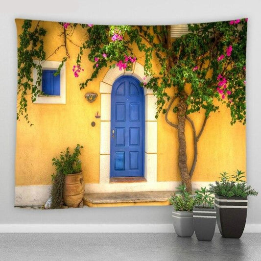 Yellow Building With Blue Door Garden Tapestry - Clover Online